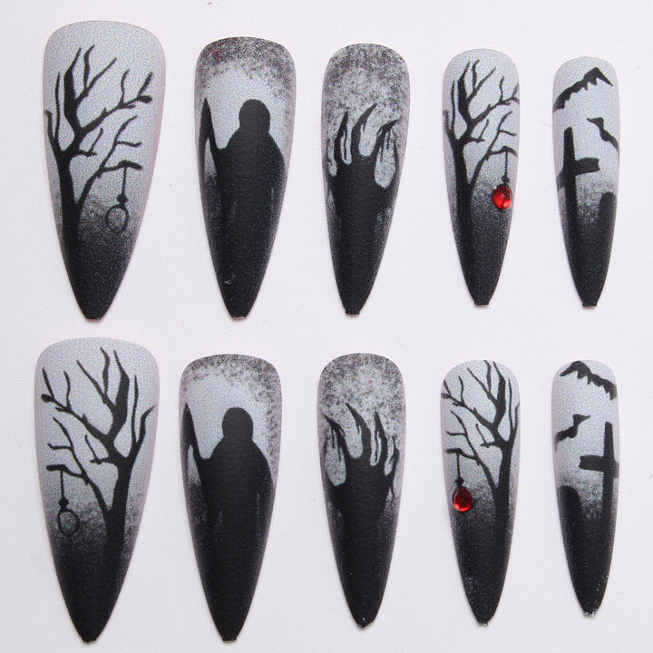 Creative press-on nails with a dark Halloween design Kalsten