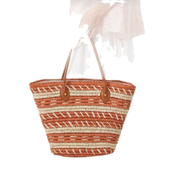 Handbag made of woven natural material with stylish leather handles Kalsten