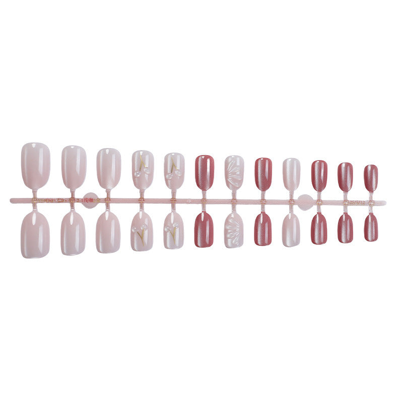 Acrylic nail set with elegant high-gloss finish and creative embellishments Kalsten
