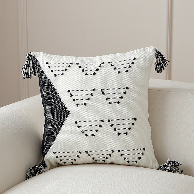 Decorative woven cushion cover with geometric tuft-relief and tassels Kalsten