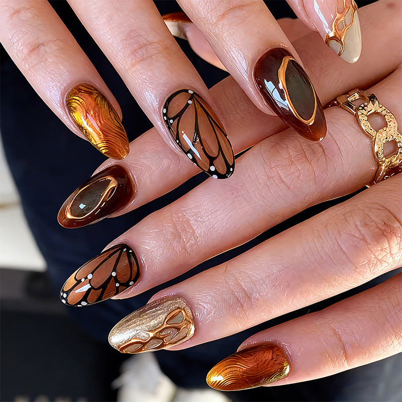 Artificial nail set with elegant gold and black design Kalsten