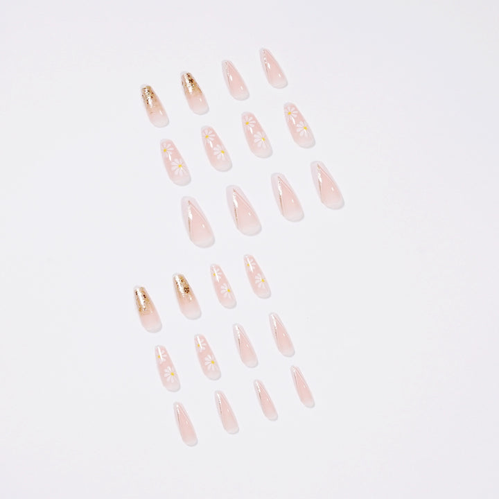 Artful nail extensions with floral designs and glitter accents Kalsten