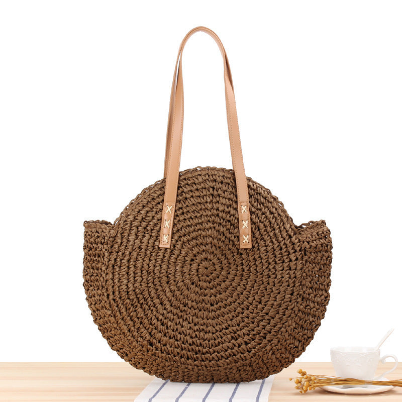 Round straw bag with leather handles Kalsten