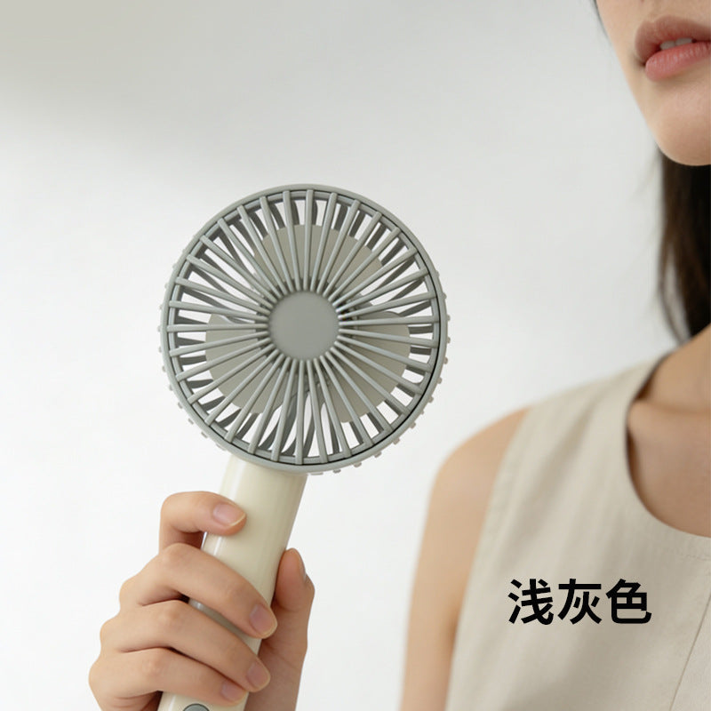 Women's portable handheld fan with ergonomic grip and powerful battery technology Kalsten