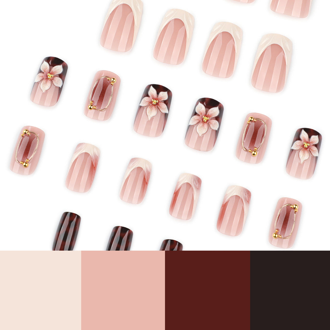 Artistic stiletto nails with elegant floral design and glitter effects Kalsten