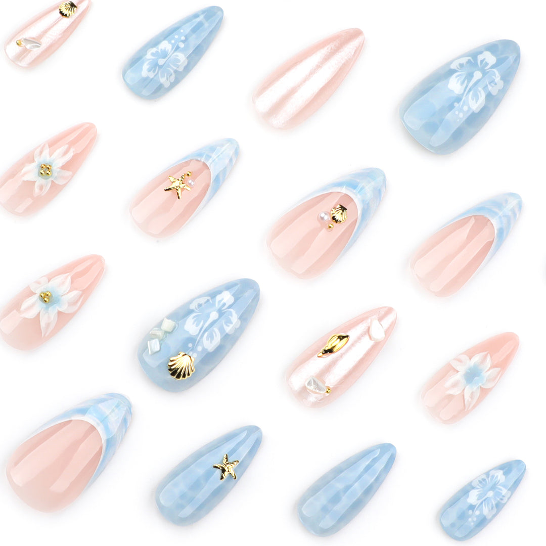 Artful nail extensions with delicate floral designs and glitter accents Kalsten