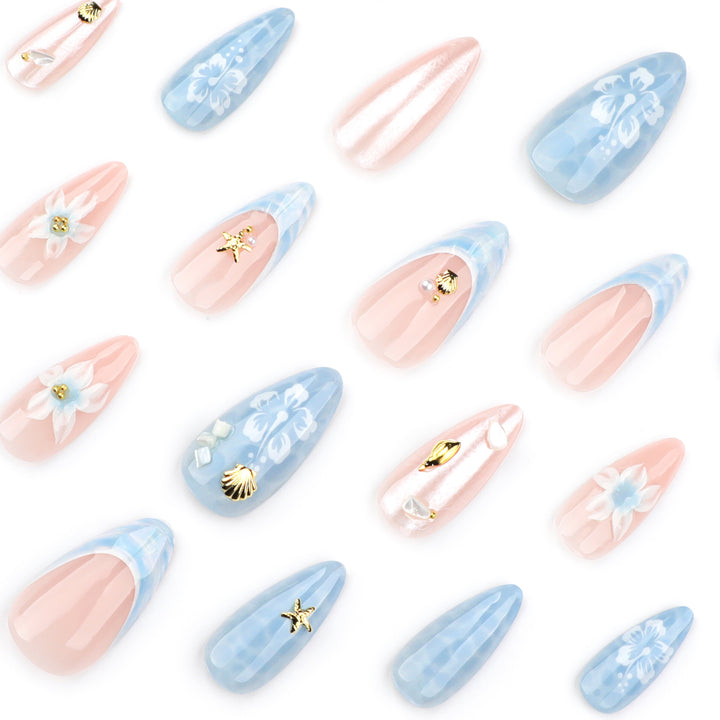 Artful nail extensions with delicate floral designs and glitter accents Kalsten