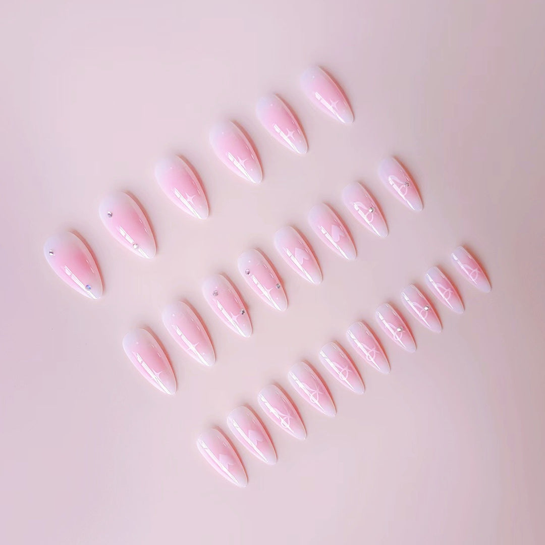 Artificial nail set with romantic heart design and embellished accents Kalsten