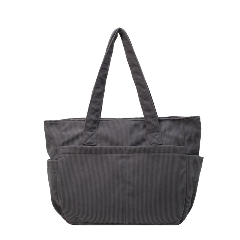 Multifunctional shoulder bag with large outer pockets Kalsten
