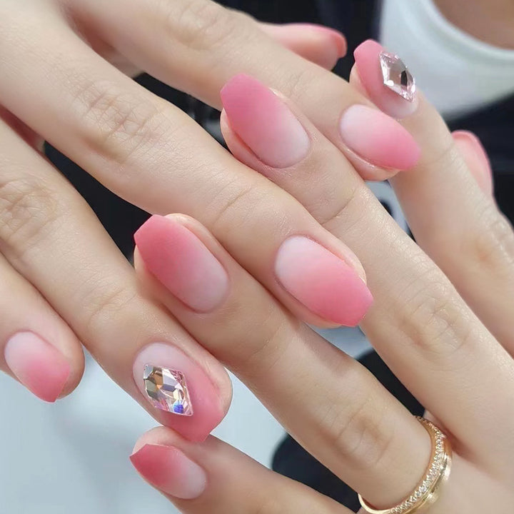 Glamorous nail art with elegant rhinestone accents Kalsten
