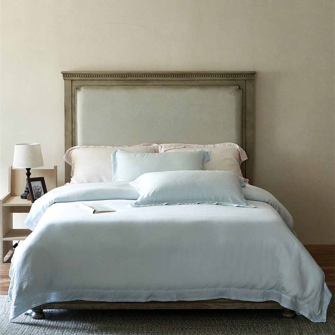 Luxury cotton bedding set with fine piping and elegant linen look