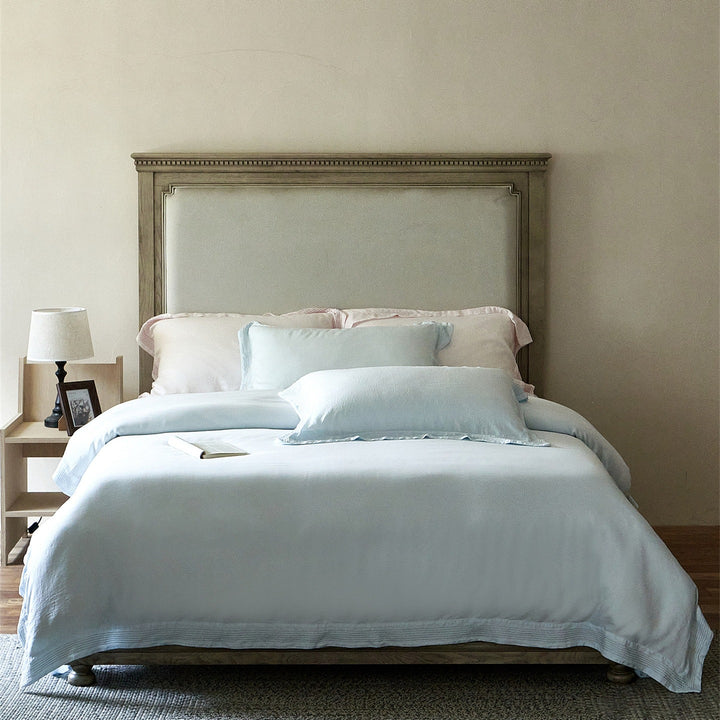 Luxury cotton bedding set with fine piping and elegant linen look