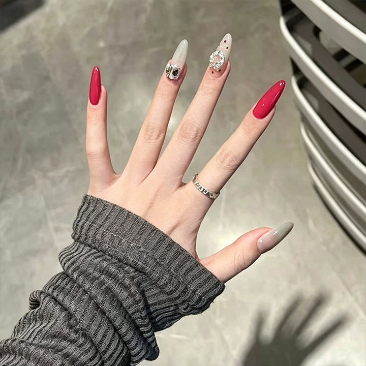 Artificial nail set with sparkling crystal accents and elegant color gradients Kalsten