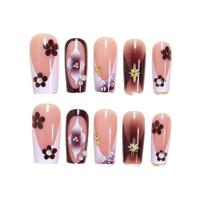 Artistic Acrylic Nail Design Set with Floral and Gold Accents Kalsten