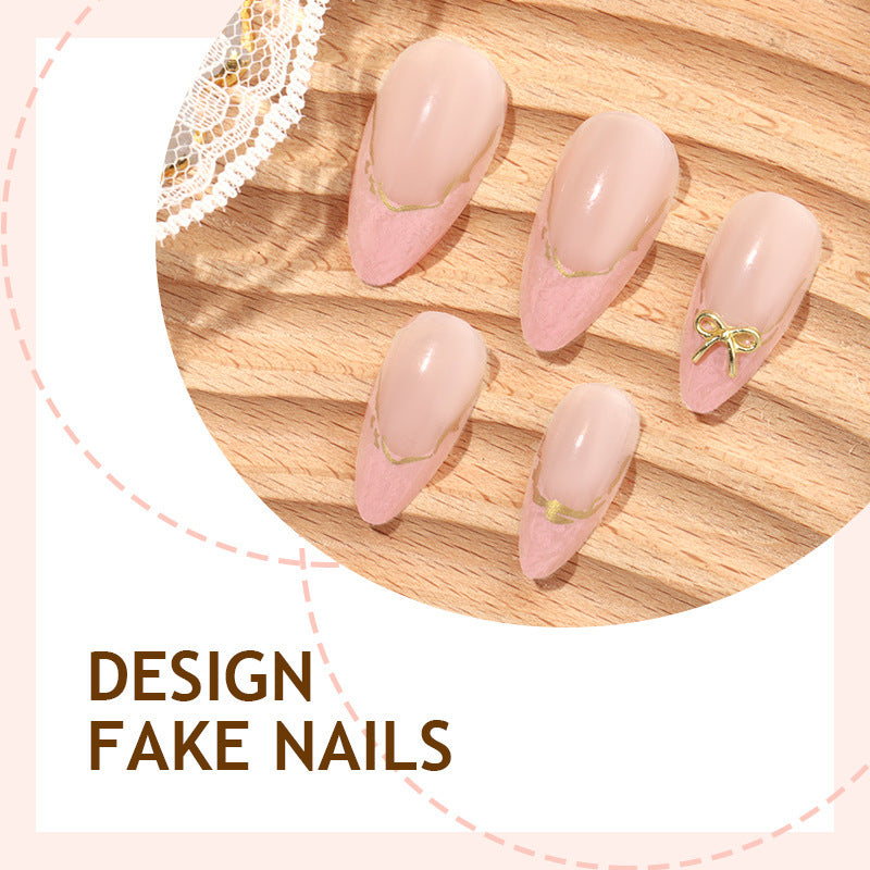 Artificial nail set with delicate bows and golden accents Kalsten