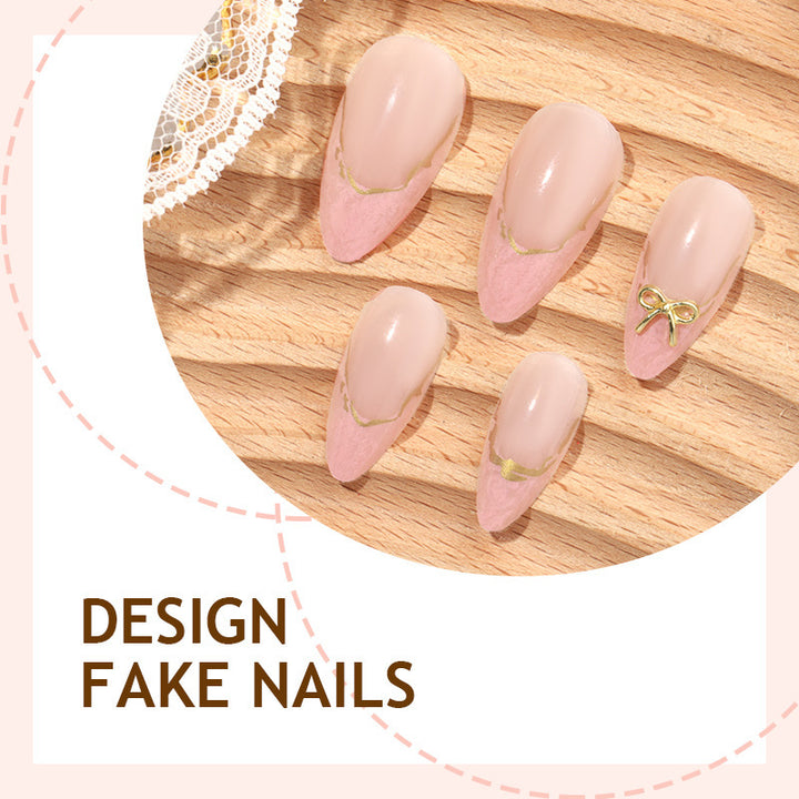 Artificial nail set with delicate bows and golden accents Kalsten