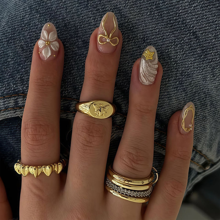 Artistic Press-On Nail Art Set with Decorative Embellishments Kalsten