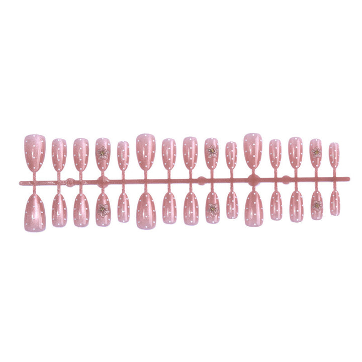 Artificial nail set with glitter and delicate floral and rhinestone embellishments Kalsten