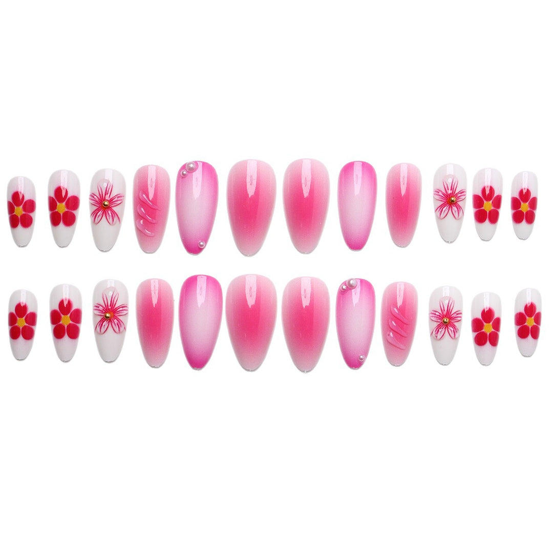 Artificial nail set with delicate flower designs and shimmering accents Kalsten