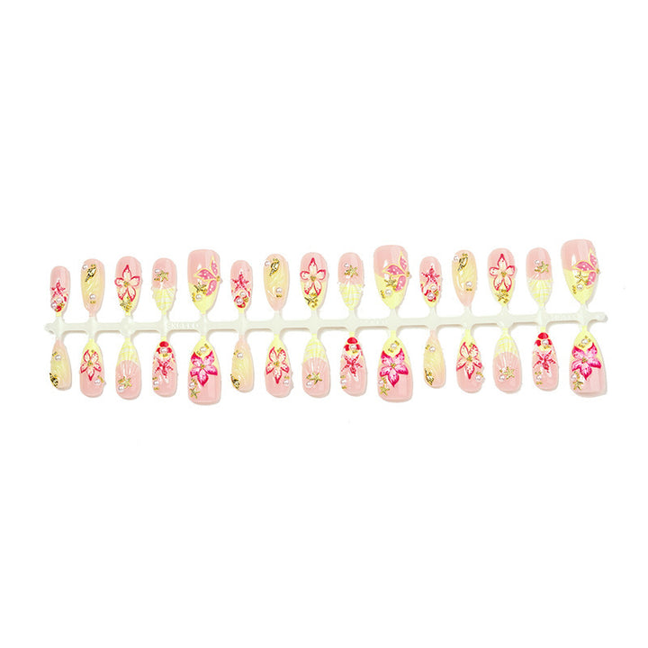 Artificial nail set with delicate floral decorations and glitter accents Kalsten