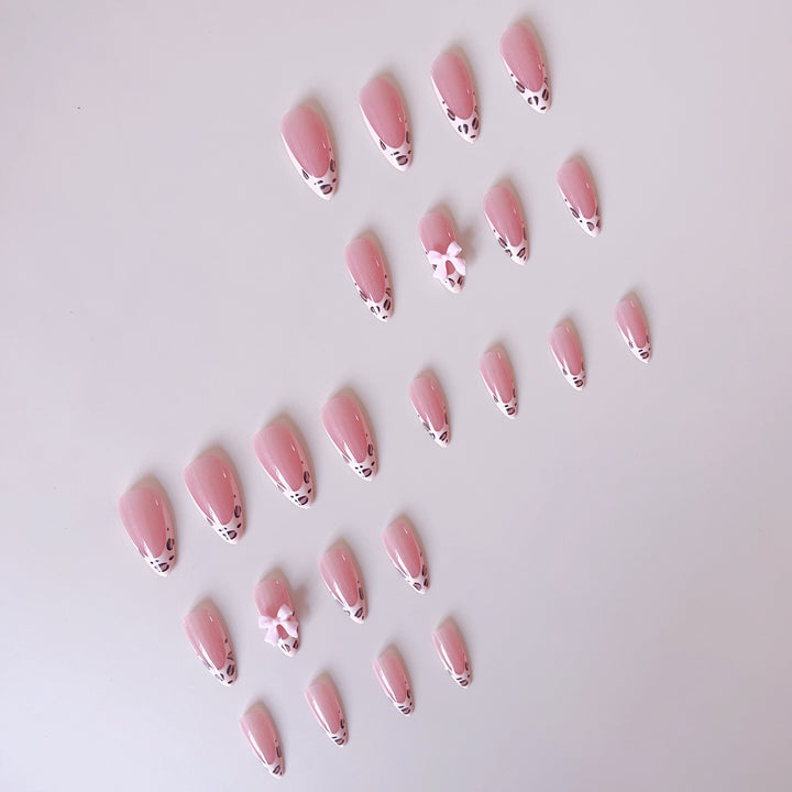 Acrylic nail set with leopard pattern and decorative bows Kalsten