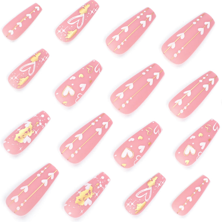 Artificial nail art with heart and glitter designs Kalsten