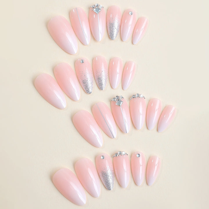 Artificial nail set with elegant glitter and rhinestone accents Kalsten
