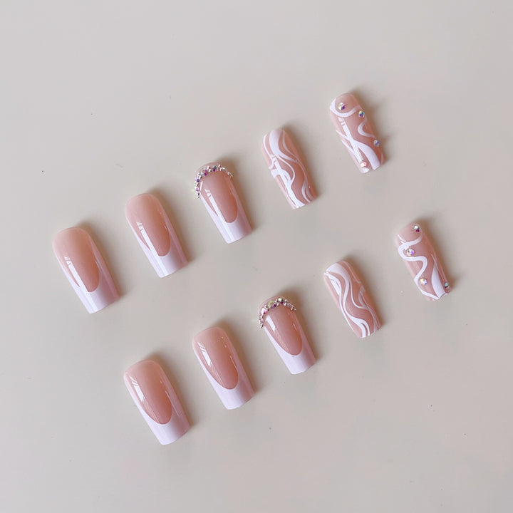 Artificial nail set with elegant French design and creative accents Kalsten