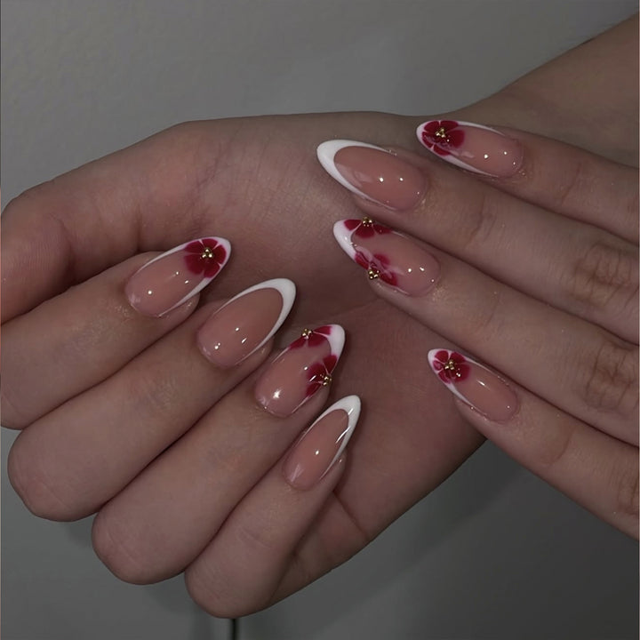 Artistic stiletto nails with luxurious floral design Kalsten