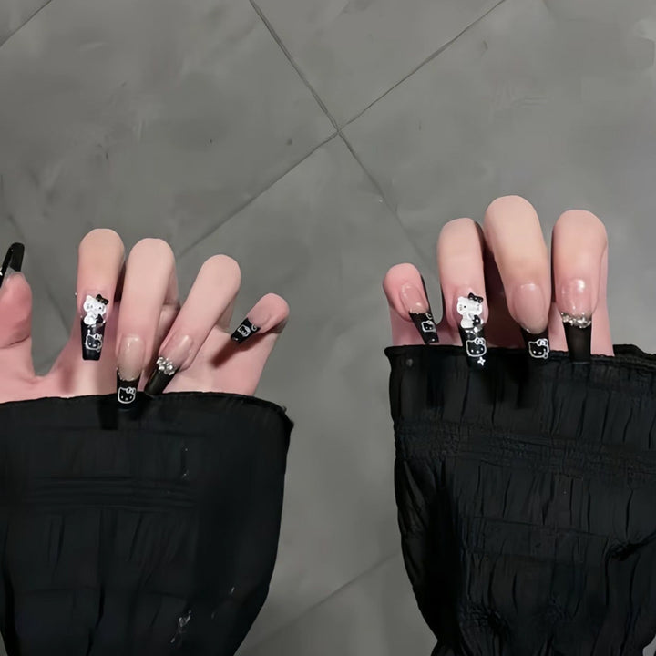 Artificial nail set with festive gift design and elegant glitter accents Kalsten