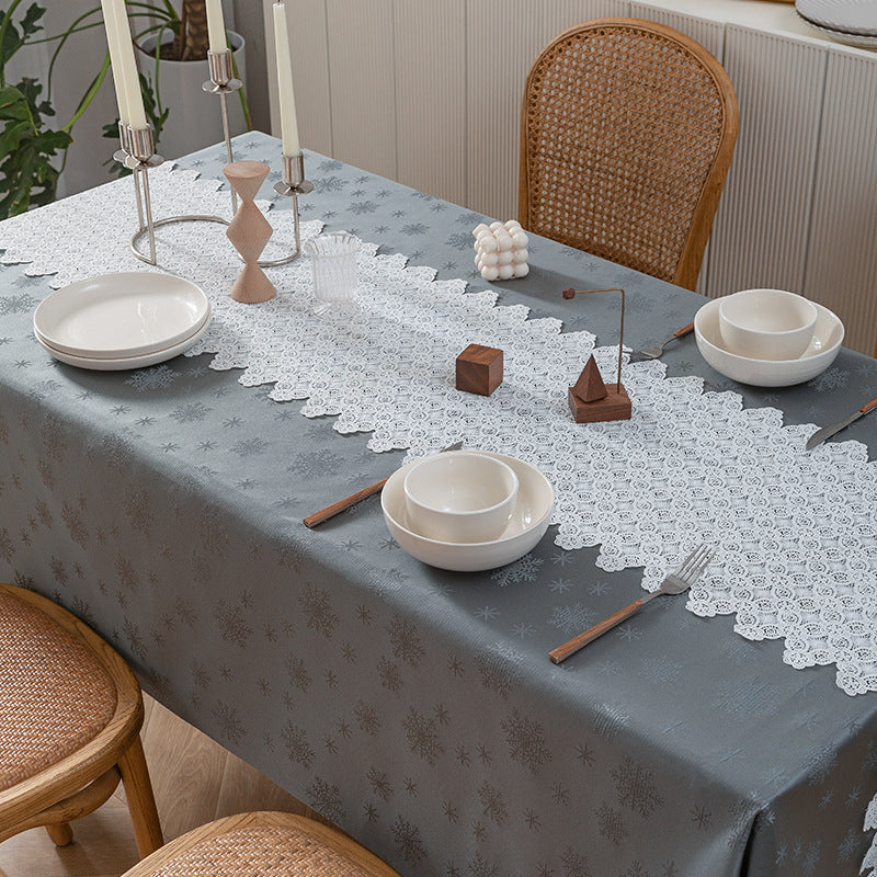Rectangular premium table linen made of jacquard polyester with subtle frost floral embossing Kalsten