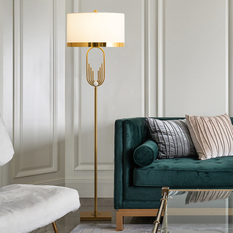 Artistic Table Lamp with Gold and Cream Features