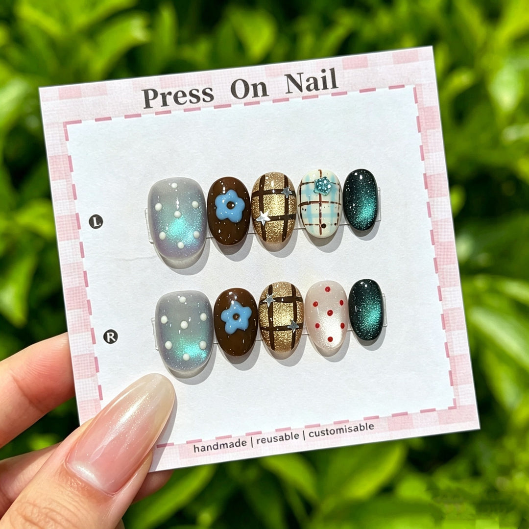 Artistic Press-On Nail Set with Floral and Graphic Designs