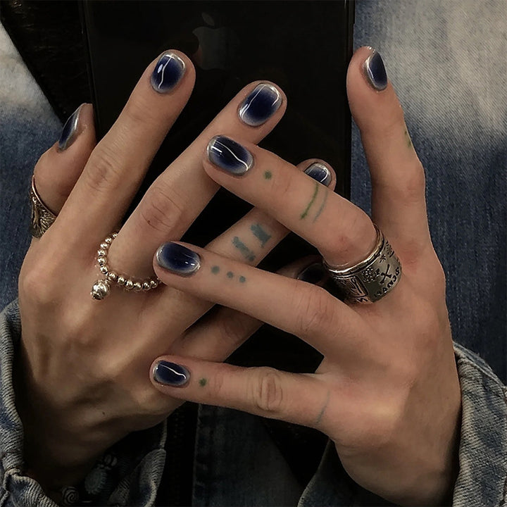 Acrylic nail set with luxurious gradient and modern accents Kalsten
