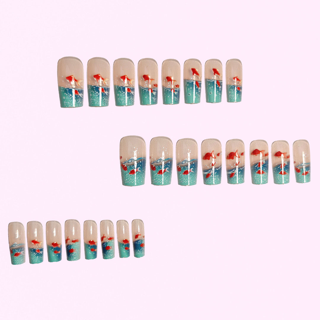 Artifical nails with maritime goldfish design Kalsten