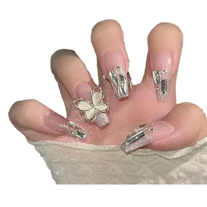 Glamorous artificial nails with delicate flower and glitter effects Kalsten