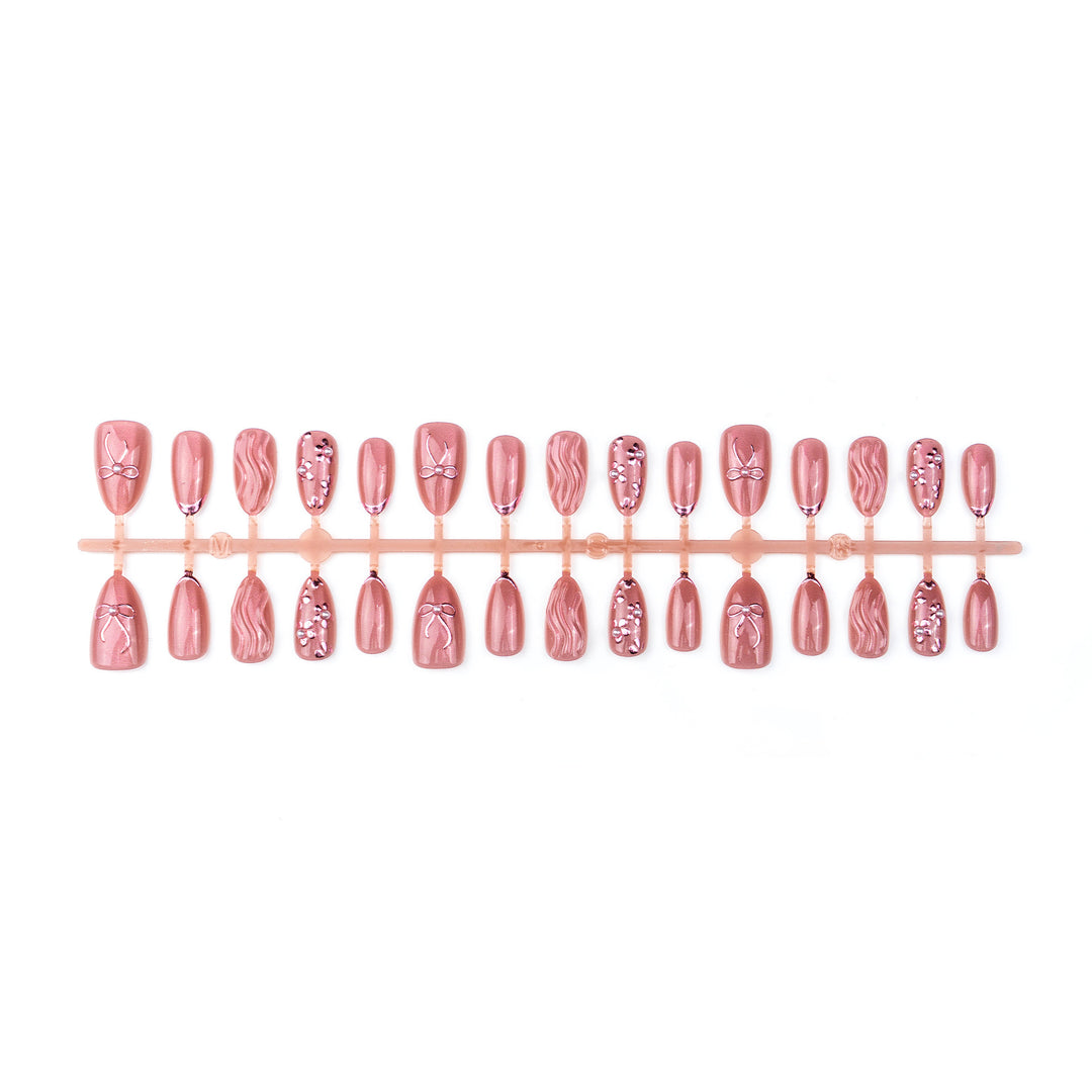 Nail art set with elegant bows and pearl accents Kalsten