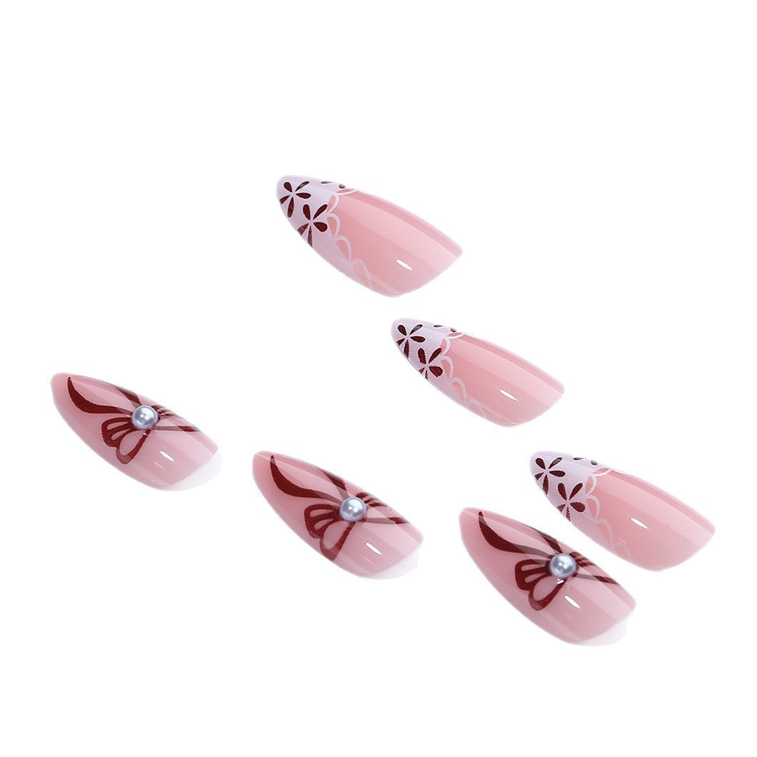 Elegant artificial nail design with floral accents Kalsten