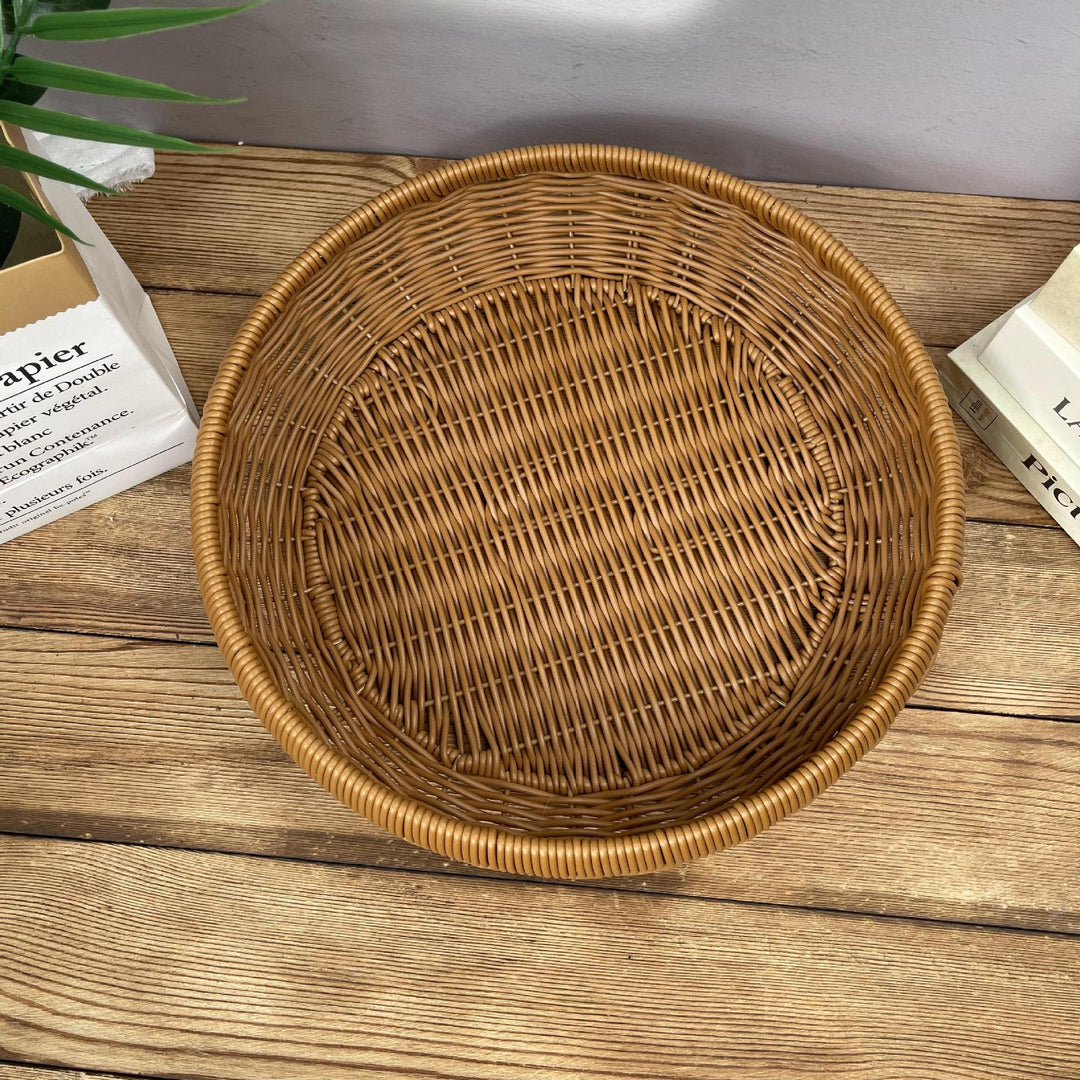 Women’s round serving basket made of woven rattan Kalsten