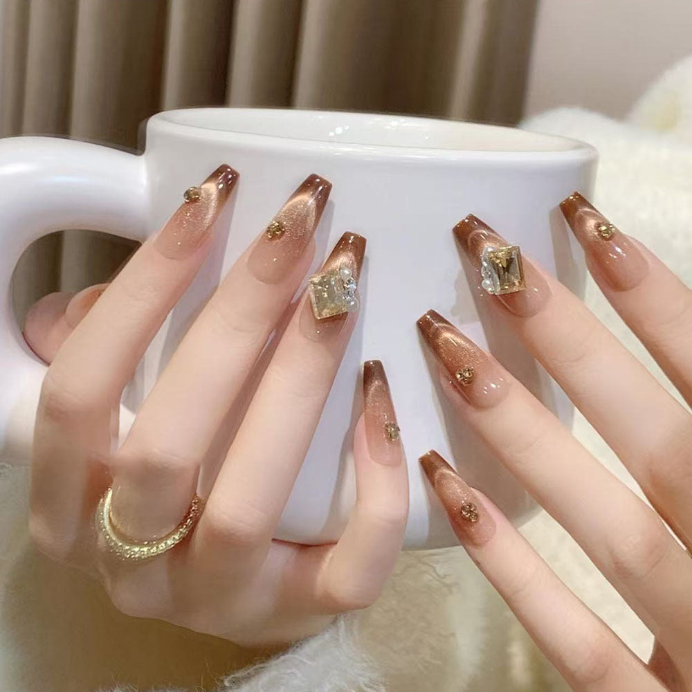 Artificial nails with elegant ombre effect and exquisite gemstones Kalsten