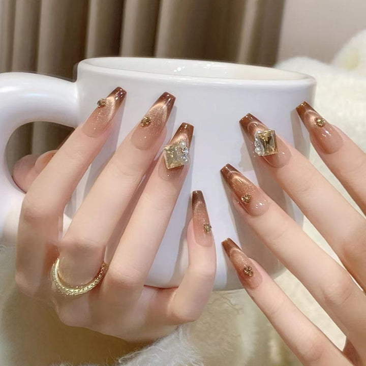 Artificial nails with elegant ombre effect and exquisite gemstones Kalsten