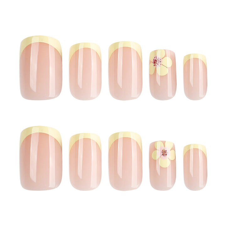 Artistic French-tip nails with floral decorations Kalsten