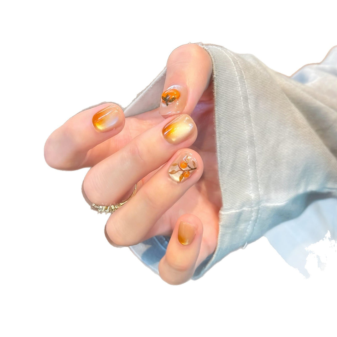 Artificial nails in elegant ombre look with floral accent Kalsten