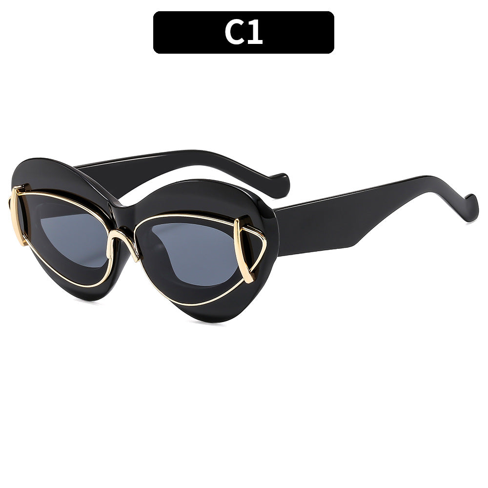 Retro-Inspired Cat-Eye Sunglasses with Unique Frame Details