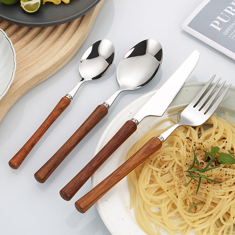 Elegant serving spoon with ergonomic wooden handle Kalsten