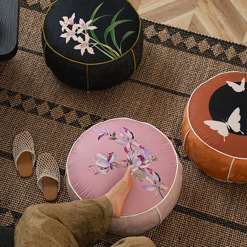 round floor sitting pouf with butterfly motif and sturdy canvas cover Kalsten