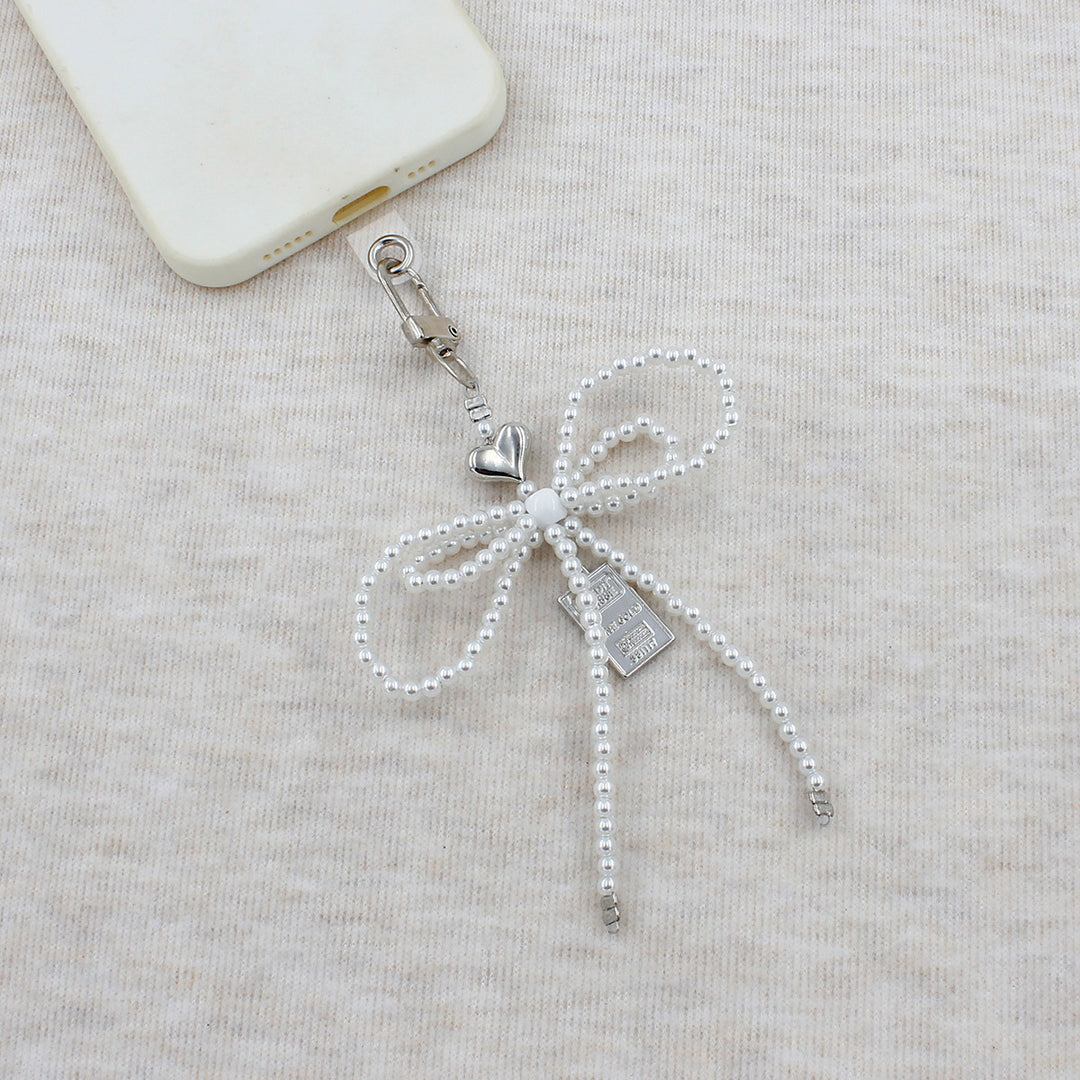 Elegant Beaded Bow Brooch Kalsten