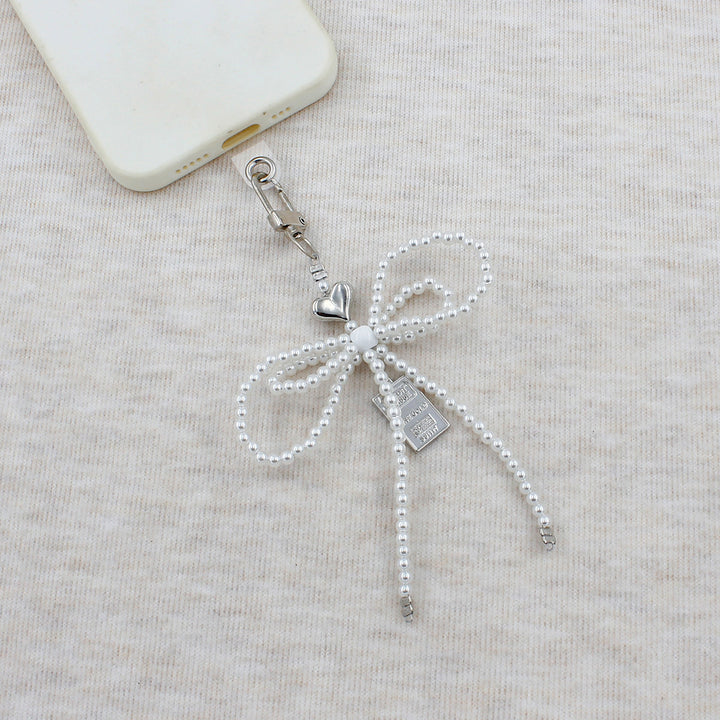 Elegant Beaded Bow Brooch Kalsten