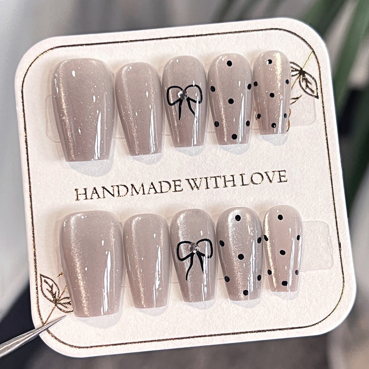 Artful Nail Extensions with Colorful Bow Motifs Kalsten