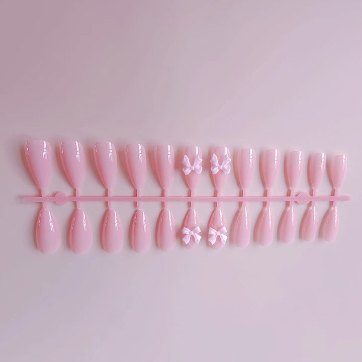 Artificial nails with elegant bow accents Kalsten